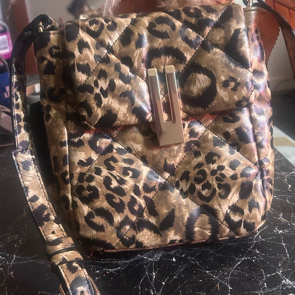 Chic Leopard Print Quilted Handbag with Gold Accents